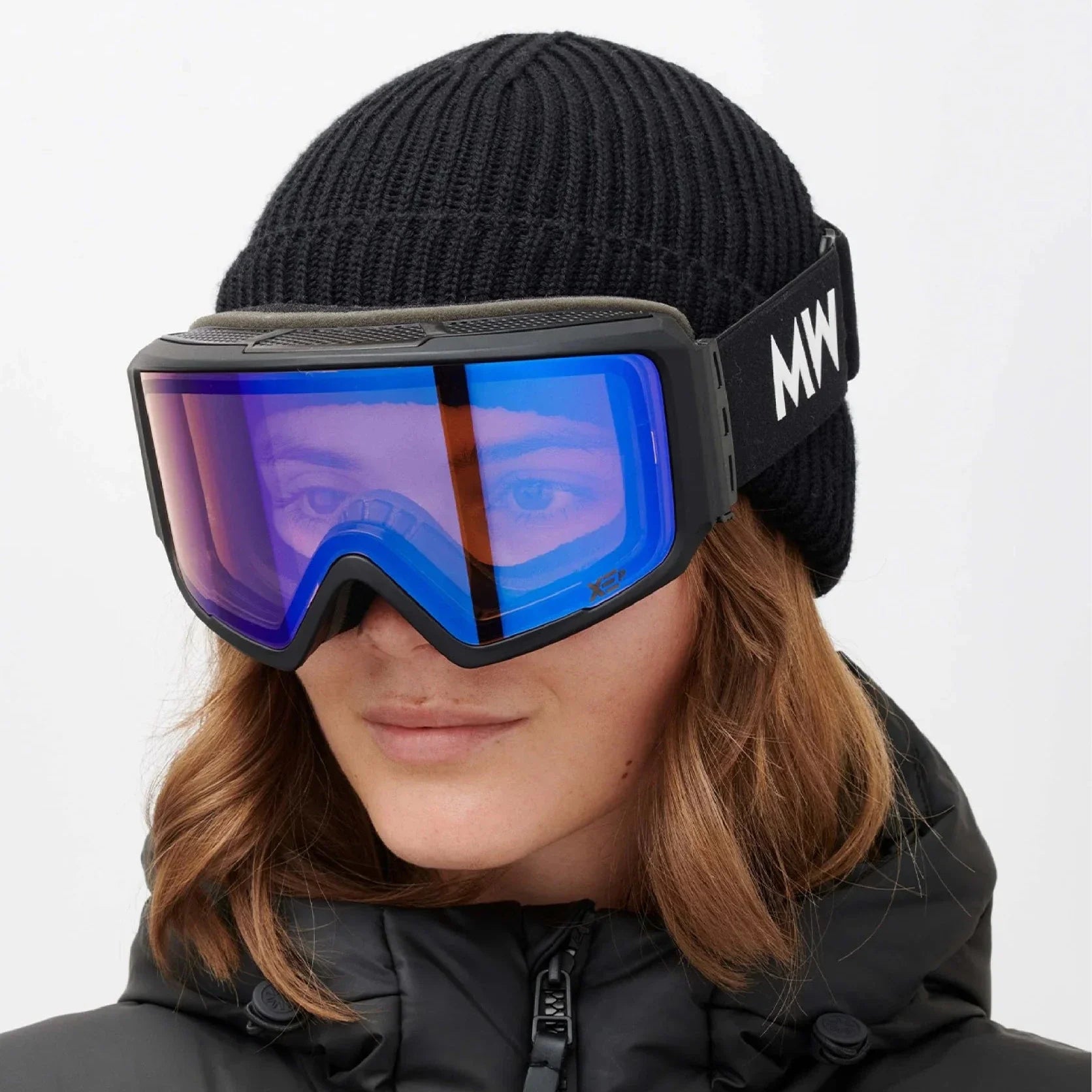 Women wearing a pair of Messy Weekend Ski Goggles