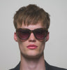 male model wearing Oversized Lilly Sunglasses with light tortoiseshell frame  AKJAERBEDE - PUNCH Watch & Eyewear vid